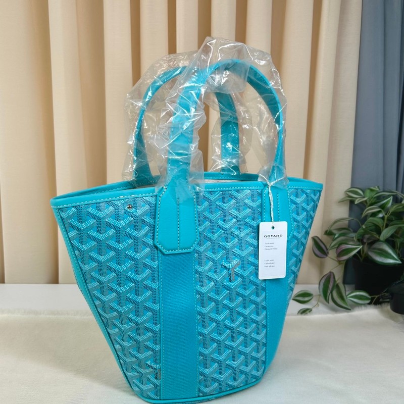 戈雅 BELHARRA沙灘包   陽光下度假的完美伴侶 其標誌性的水桶形狀和大開口設計 可輕鬆放入日常用品 兩個舒適的扁手柄 既可手提也可肩背 可拆卸的皮肩帶可以斜挎或單肩-7