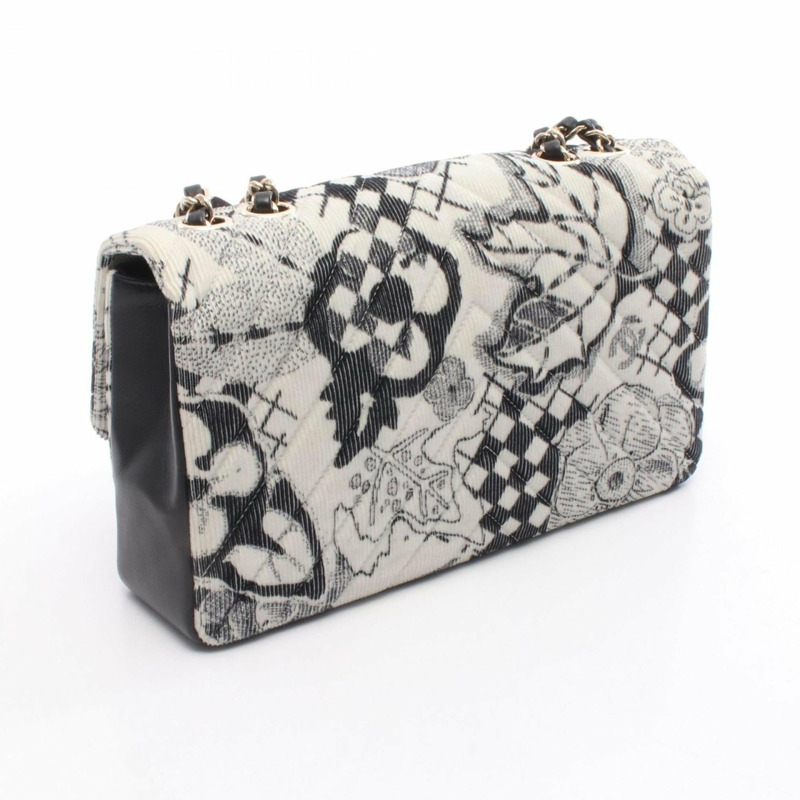 香奈兒人字紋V形縫線肩背包，皮革和燈芯絨材質，女士，白色/黑色-1