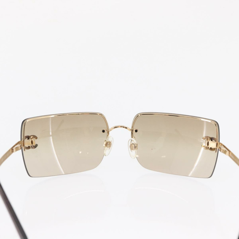 【日本直送】香奈兒 CC 鑲鑽無框太陽眼鏡 金屬棕色 CC 正品 am10473V-1