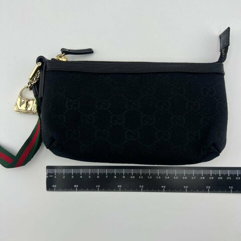 古馳 雙 G 老花帆布腋下包