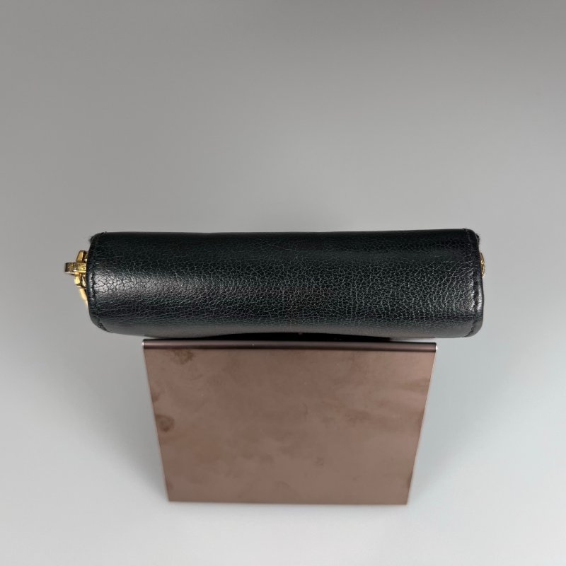 YSL 352906 黑浮雕釦式短夾-5