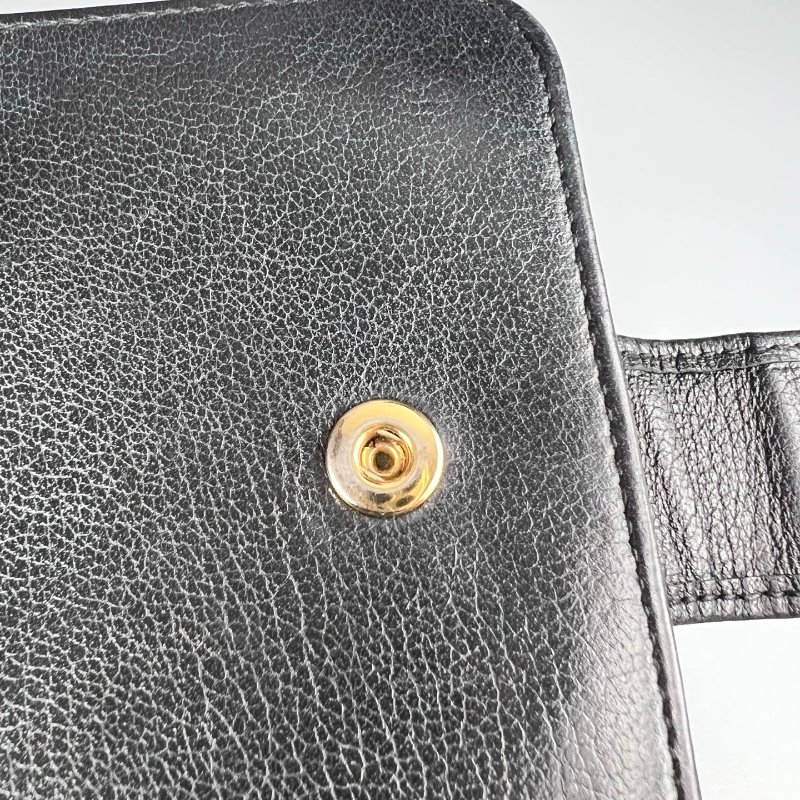 YSL 352906 黑浮雕釦式短夾-11