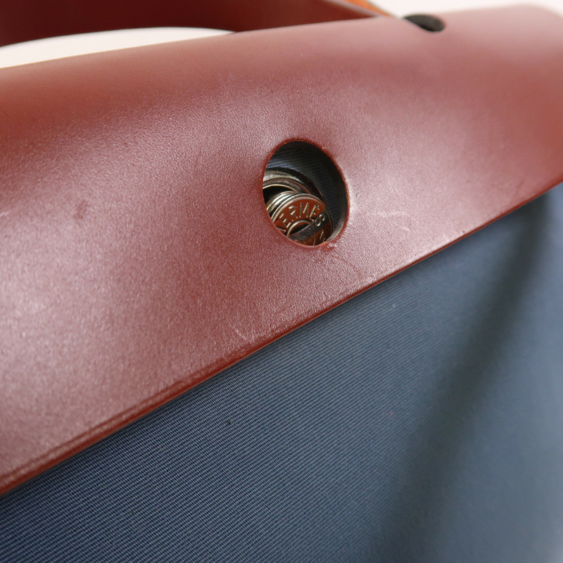 HERMES 帆布Herbag PM銀扣手挽肩背兩用袋Bleu Tempete/Rouge H-21