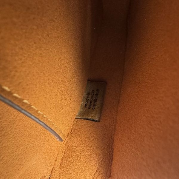 Coach 粉拋光鵝卵石斜背包-18