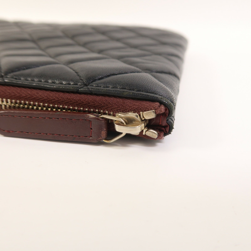 CHANEL 羊皮皮革Pouch金扣手拿包-14