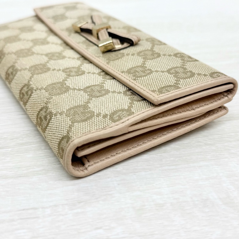 GUCCI皮夾緹花布拚淡粉蝴蝶結造型下蓋雙面長夾-15