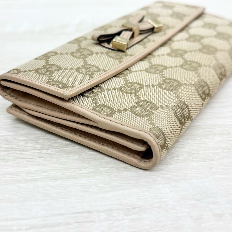 GUCCI皮夾緹花布拚淡粉蝴蝶結造型下蓋雙面長夾-16