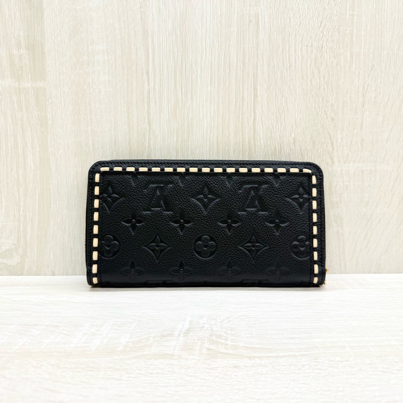 LV黑色牛皮壓紋滾白邊Zippyㄇ拉長夾M64805-1