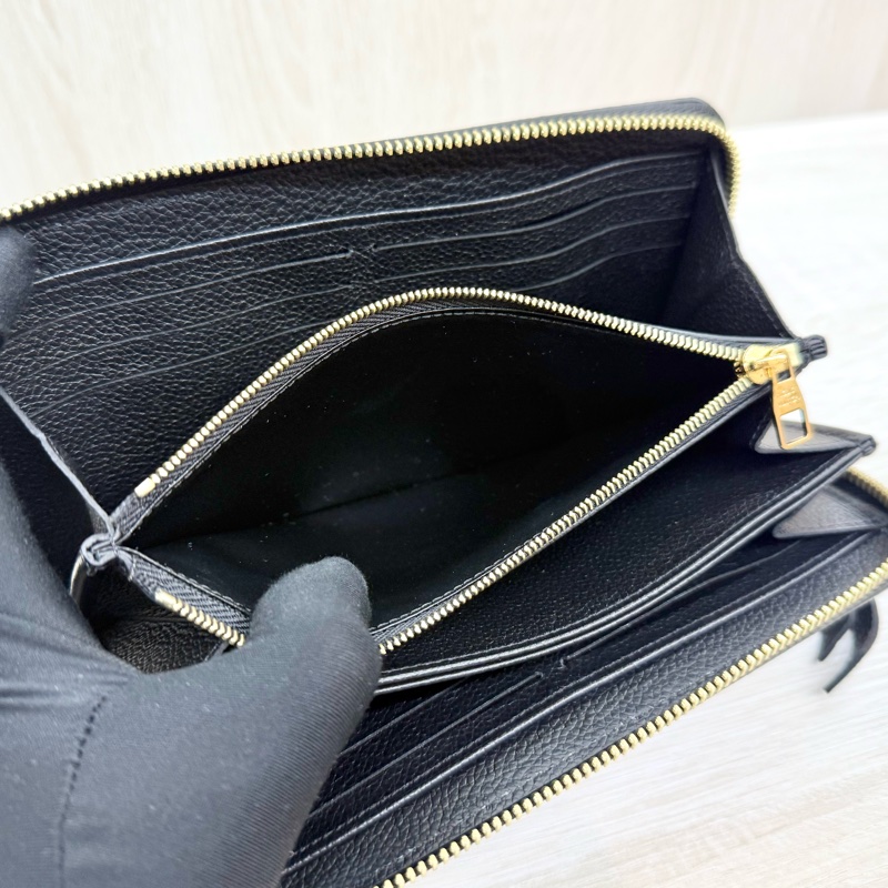 LV黑色牛皮壓紋滾白邊Zippyㄇ拉長夾M64805-6