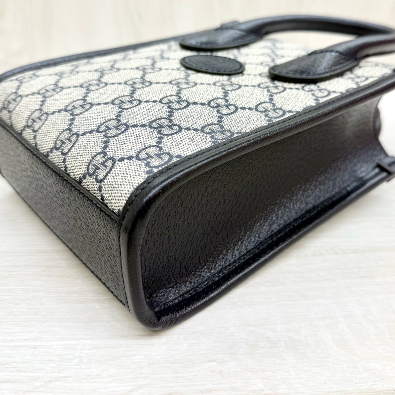 GUCCI原花拼深藍色牛皮INTERLOCKING GG琴譜包671623-9