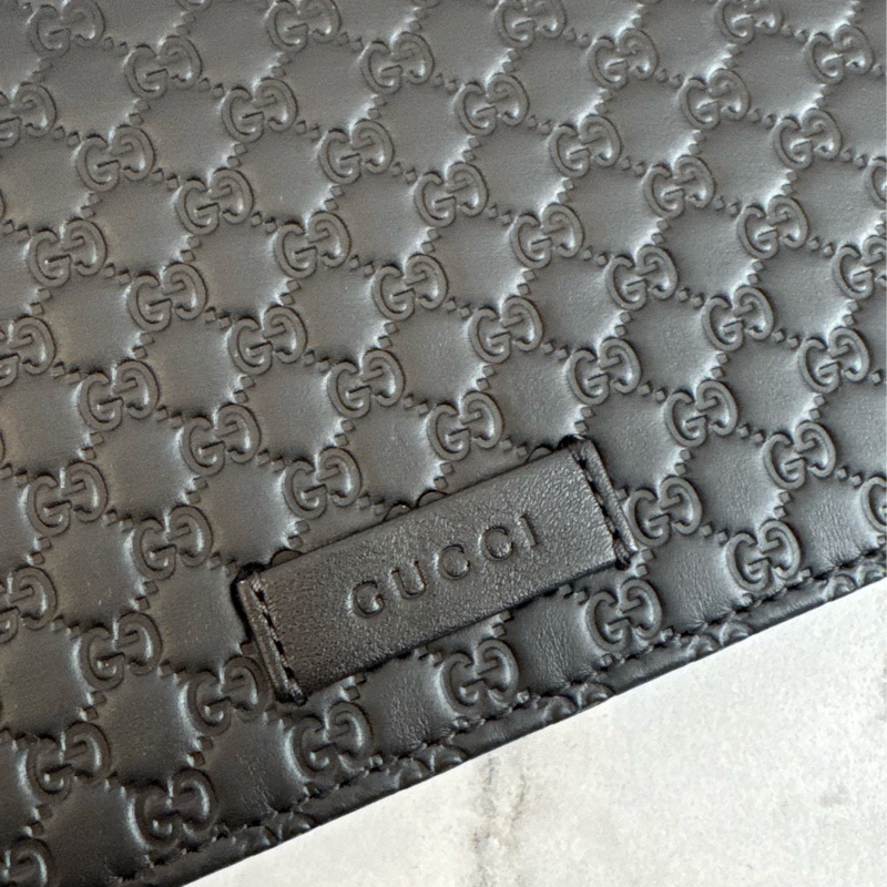 Gucci黑壓紋釦式手拿包/長夾/斜背包-10