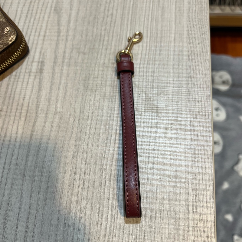 【COACH】花朵X卡其PVC滿版LOGO酒紅手提帶拉鍊式長夾-14