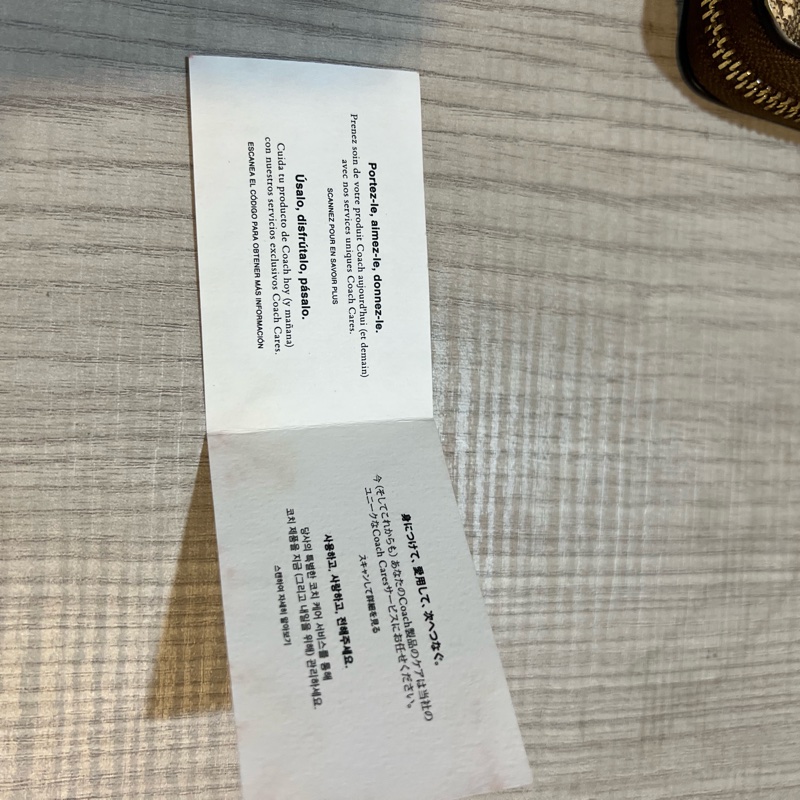 【COACH】花朵X卡其PVC滿版LOGO酒紅手提帶拉鍊式長夾-17