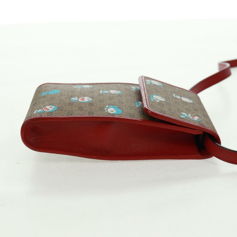 【日本直送】GUCCI Micro GG Supreme哆啦A夢肩包 PVC 米色 金色 647805 正品 163610M-3