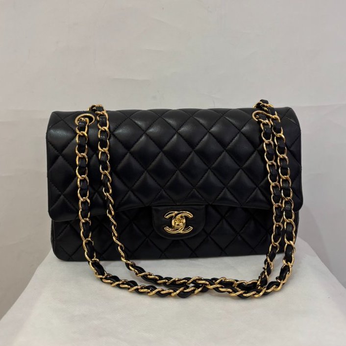 Chanel黑色金釦小羊皮CF25-0