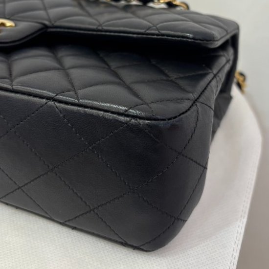 Chanel黑色金釦小羊皮CF25-5