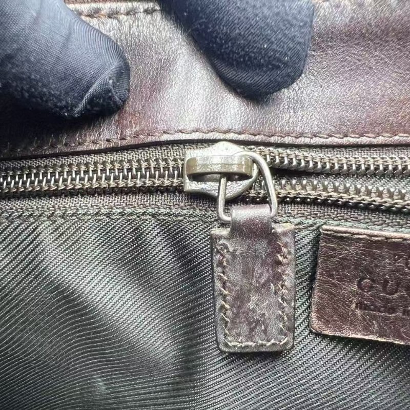 古馳經典雙 G 老花帆布斜挎包-17