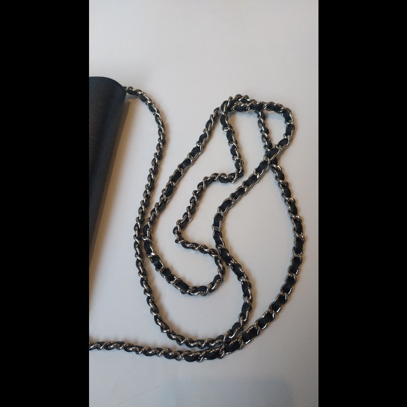 Chanel 銀鍊山茶花壓紋黑皮鍊帶小包 WOC-22