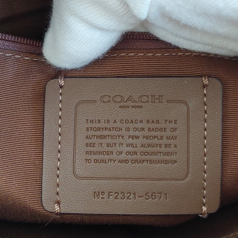 COACH 🎀現品實拍 🎀經典撞色印花LOGO 雙肩後背包.駝/咖-45