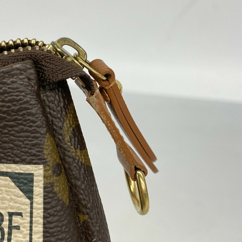 路易威登 Monogram Trusscle M63800 棕色女士包/手拿包-4