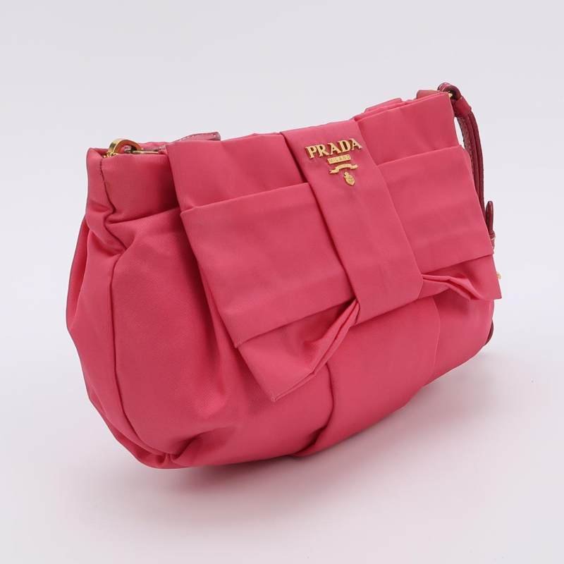 Prada羊皮尼龍布純色蝴蝶結裝飾字母logo手拿包-2