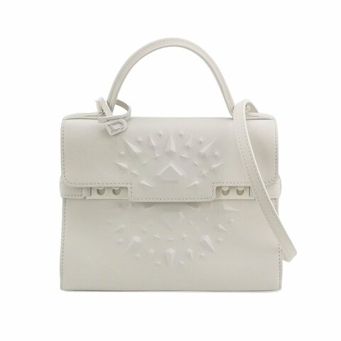 Delvaux Tempete小號牛皮純色浮雕圖騰T形翻蓋手提包單肩包