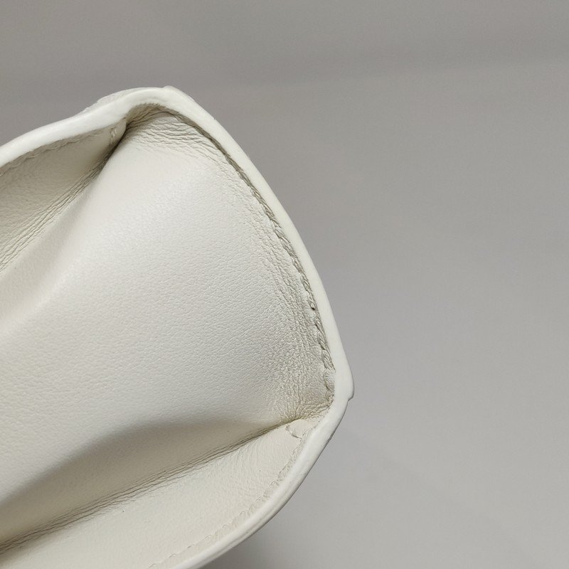 Delvaux Tempete小號牛皮純色浮雕圖騰T形翻蓋手提包單肩包-14