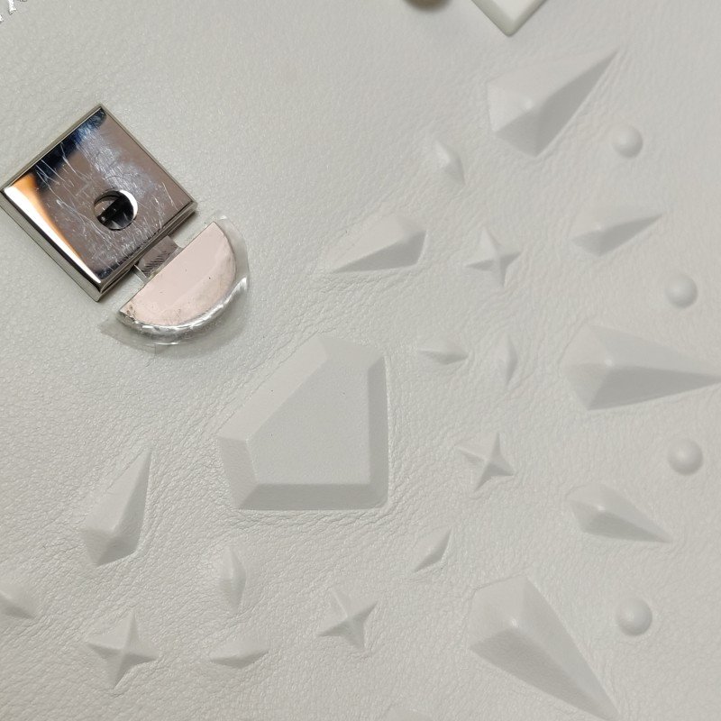 Delvaux Tempete小號牛皮純色浮雕圖騰T形翻蓋手提包單肩包-15