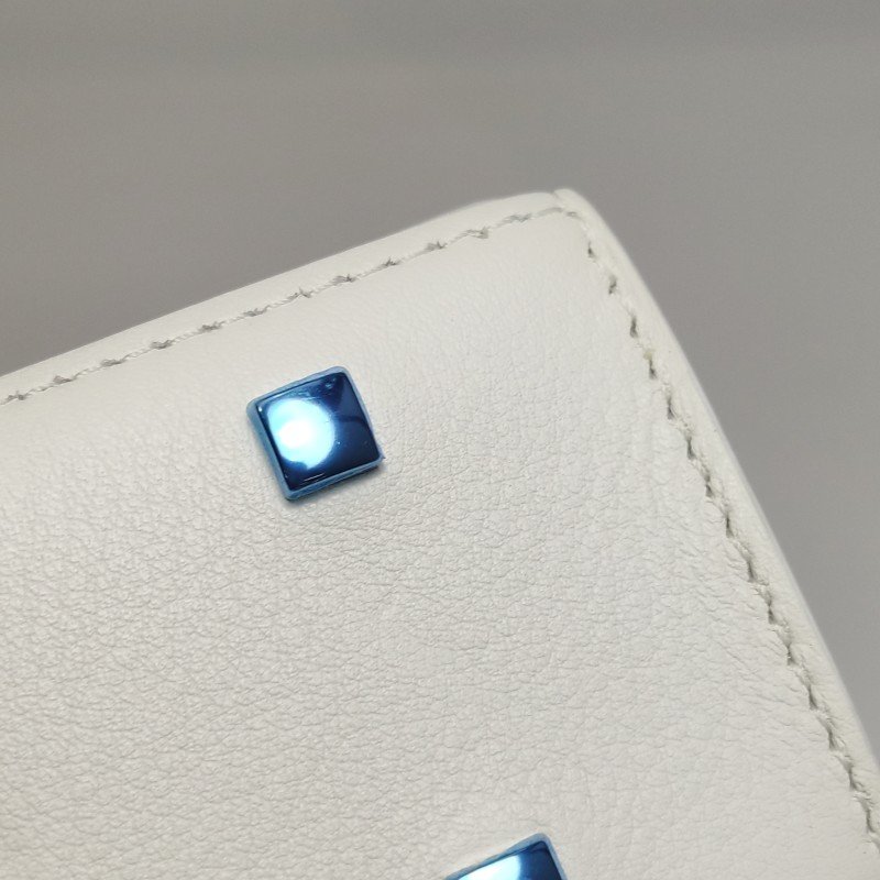 Delvaux Tempete小號牛皮純色浮雕圖騰T形翻蓋手提包單肩包-18