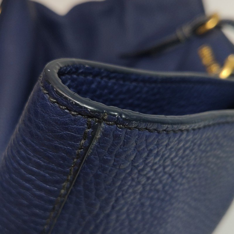 Miu Miu牛皮純色字母Logo斜挎包單肩包-18