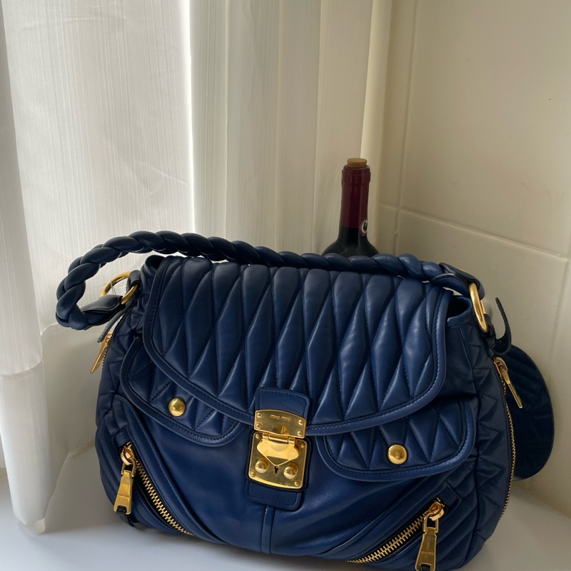 ▪️富貴選物FUGUEI▪️MIU MIU 千金秀款藍金拉鏈包-1