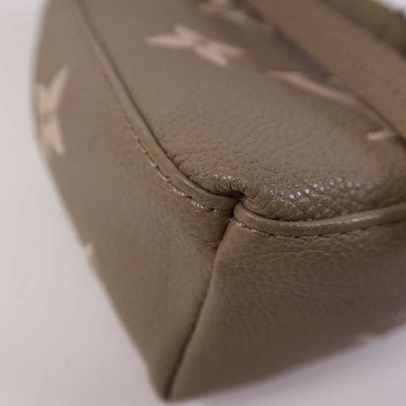 LOUIS VUITTON Monogram Empreinte Tiny金扣背包-11