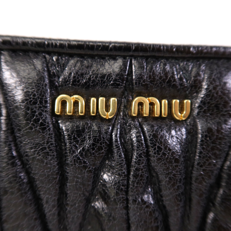 Miu Miu 羊皮皮革Wristlet金扣手拿包-6