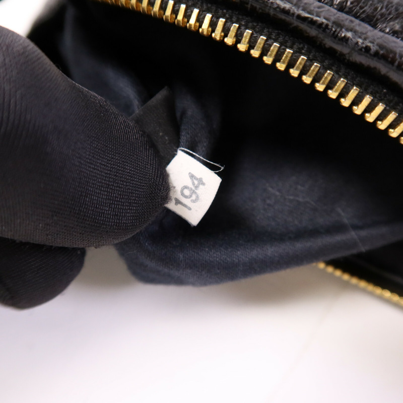 Miu Miu 羊皮皮革Wristlet金扣手拿包-7