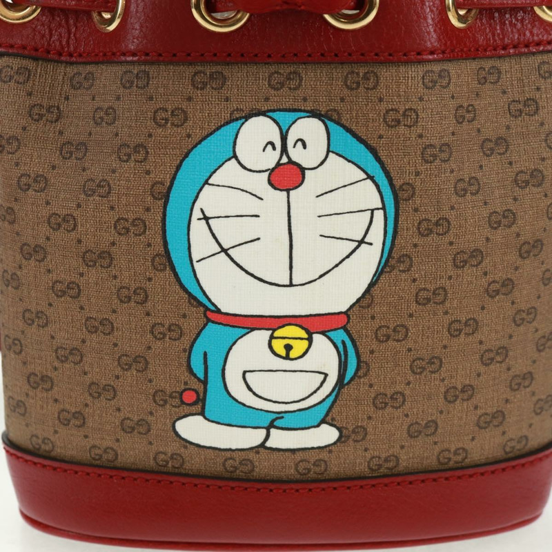 【日本直送】GUCCI Micro GG Supreme哆啦A夢聯名包 PVC 米色 647801 正品 166733SAM-1