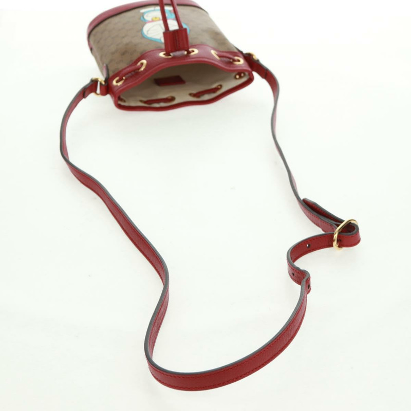 【日本直送】GUCCI Micro GG Supreme哆啦A夢聯名包 PVC 米色 647801 正品 166733SAM-7