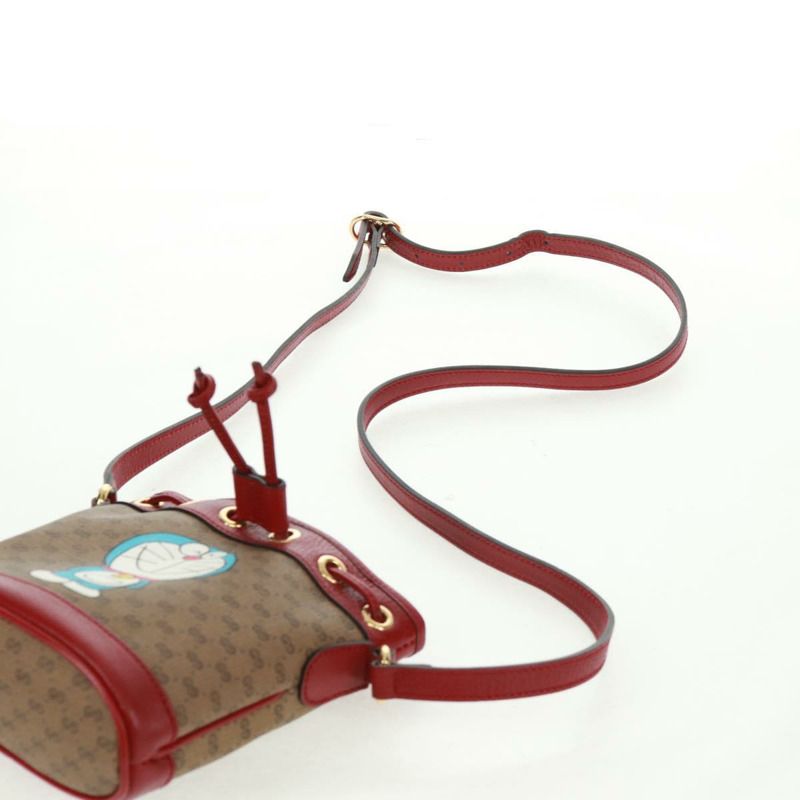 【日本直送】GUCCI Micro GG Supreme哆啦A夢聯名包 PVC 米色 647801 正品 166733SAM-13