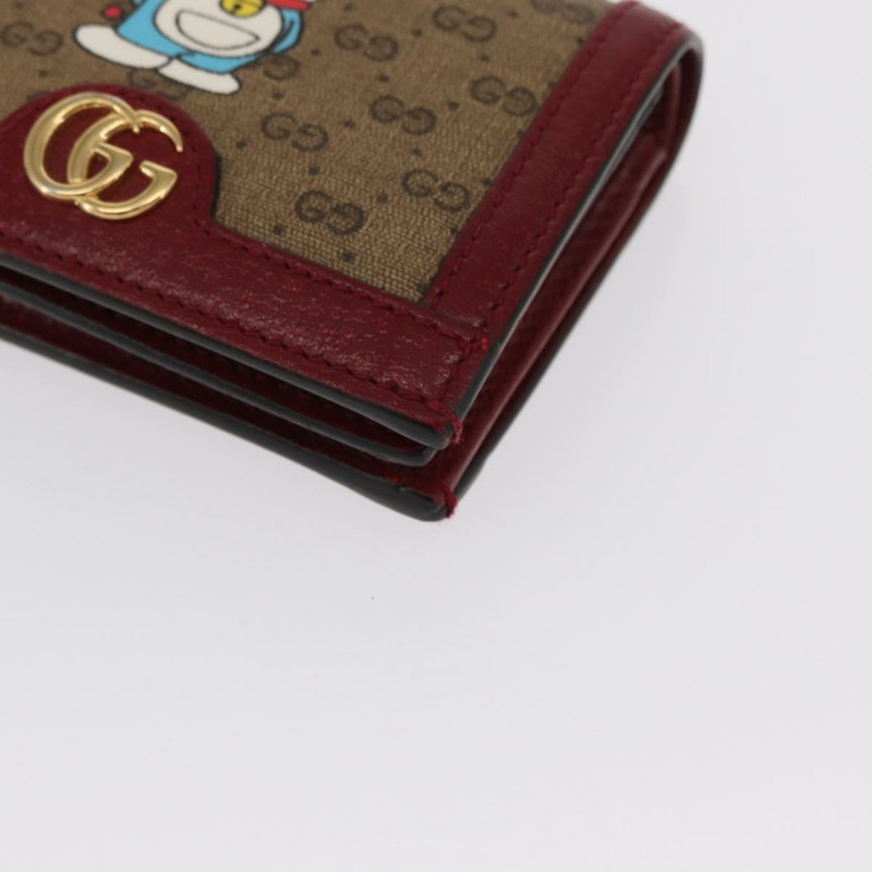 【日本直送】GUCCI Micro GG Supreme哆啦A夢錢包 PVC 米色 金色 647788 正品 165954SAM-13
