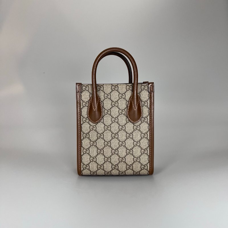 GUCCI 671623  咖老花琴譜包-1