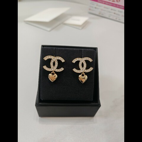 Chanel 24 earrings cc with gold heart