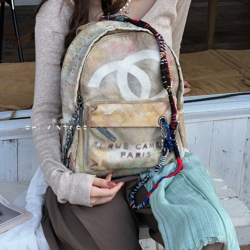 Chanel反戰塗鴉後背包米色仿舊28*33*12 98新配件塵袋掛繩-0