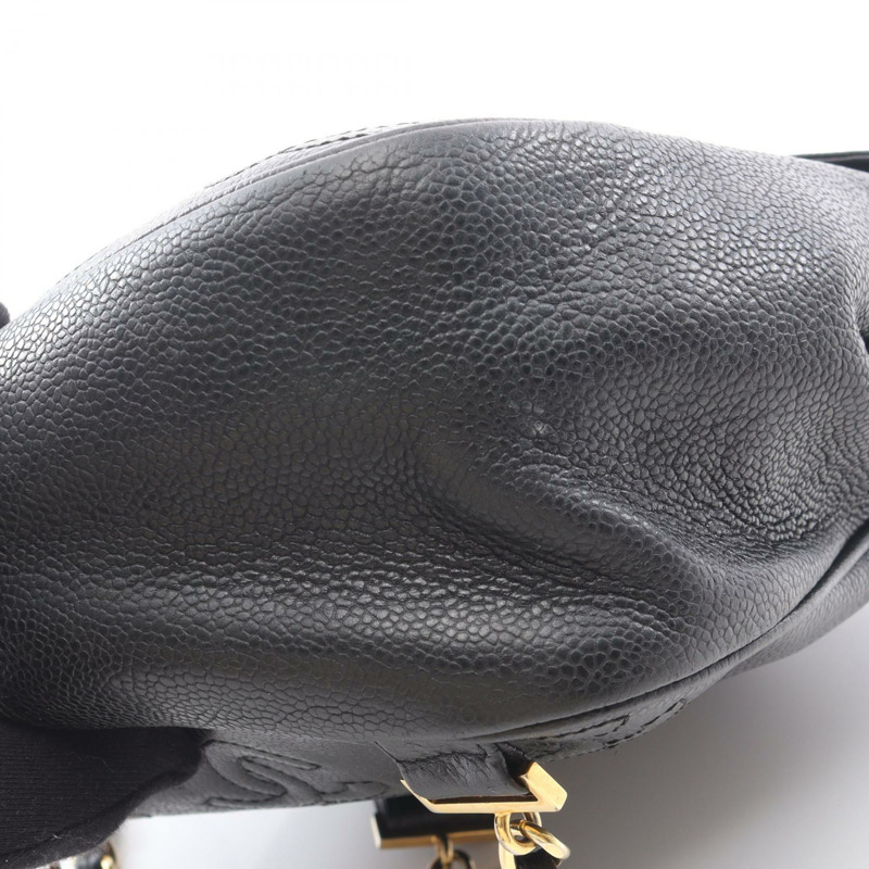 香奈兒 (CHANEL) 三重 COCO 標誌雙肩包，粒面小牛皮，黑色，二手，金色五金 CC-9