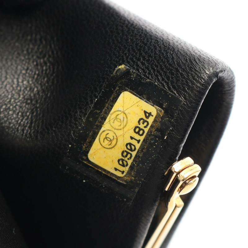 香奈兒 COCO 標誌雙折長皮夾，粒面小牛皮，黑色，二手 CC-4