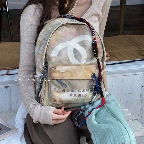 Chanel反戰塗鴉後背包 中古絕版品 米色仿舊28*33*12 98新配件塵袋掛繩