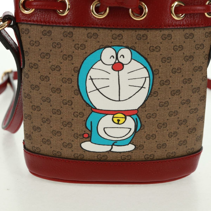【日本直送】GUCCI 哆啦A夢迷你GG Supreme單肩包 PVC 米色 金色 647801 正品 168092M-1