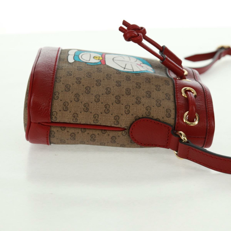 【日本直送】GUCCI 哆啦A夢迷你GG Supreme單肩包 PVC 米色 金色 647801 正品 168092M-4