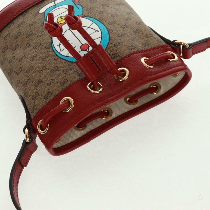 【日本直送】GUCCI 哆啦A夢迷你GG Supreme單肩包 PVC 米色 金色 647801 正品 168092M-6