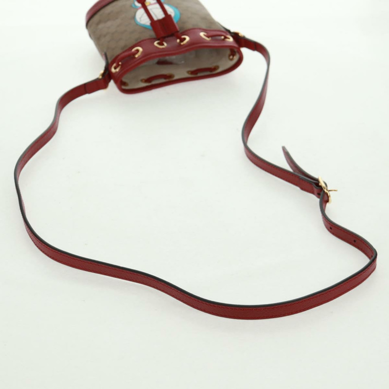 【日本直送】GUCCI 哆啦A夢迷你GG Supreme單肩包 PVC 米色 金色 647801 正品 168092M-7