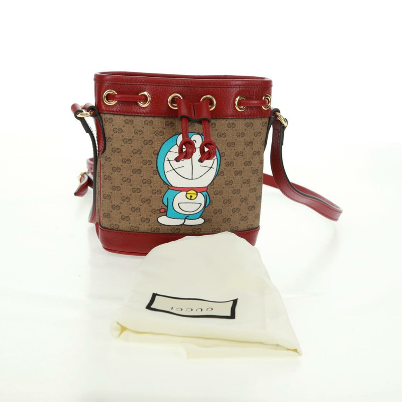 【日本直送】GUCCI 哆啦A夢迷你GG Supreme單肩包 PVC 米色 金色 647801 正品 168092M-11