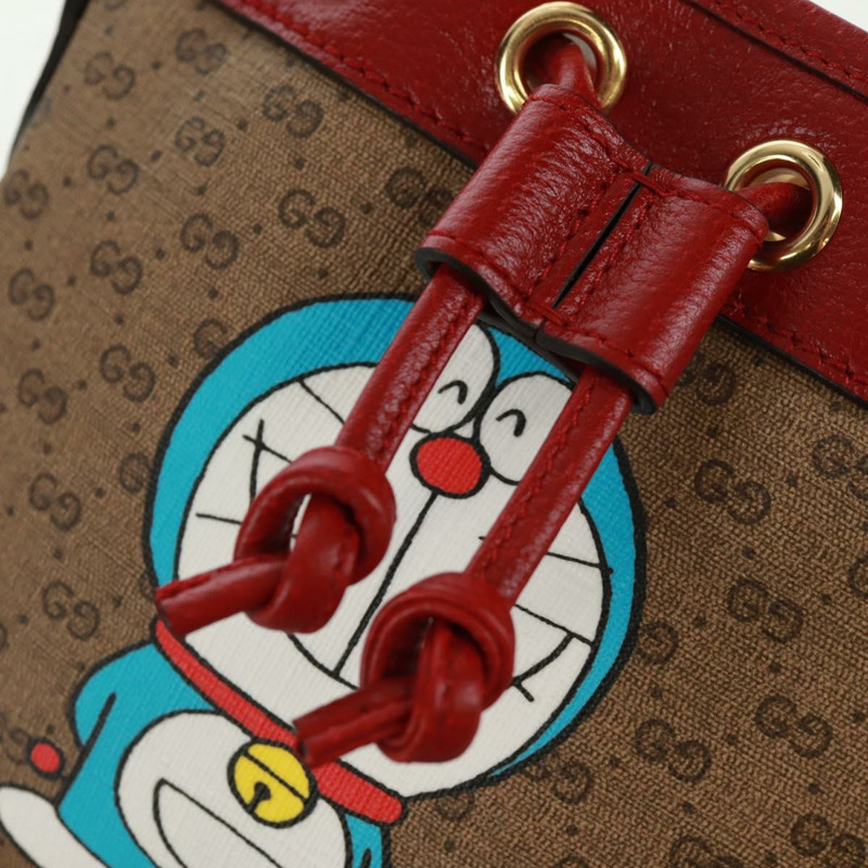 【日本直送】GUCCI 哆啦A夢迷你GG Supreme單肩包 PVC 米色 金色 647801 正品 168092M-18